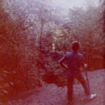 Gene Burton looking out over the Rockcastle Gorge in the Summer of 1966. Coach Dan Omlor tried to take his players on as many trips into the outdoors as possible. They would go swimming, inner tubing, canoeing, hiking or whatever else they could get into. On this particular trip they drove up to Mt. Victory, followed an old country road to a trailhead, and hiked several miles back in to Cliff's Edge. During the Summer of '66, Gene was getting ready to enter the seventh grade. He would become the lead guard on the Whiz Kids, the basketball team that would finish the season unbeaten, win the regional title and reach the state finals before losing. A thousand feet below Gene in this photo is The Narrows, a tricky stretch of white water where canoeists have to maneuver between a series of boulders. The boys and their coach ate lunch here and watched the canoeists far below try their luck.