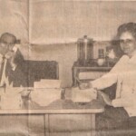 Bob Overbey at his principal's desk with Mrs. Marlene Meece, Secretary and Treasurer of the Board of Education. Herbert Higgins was Superintendant at this time.