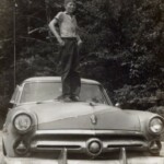 Cruising For A Bruising: Bert Minton, age 16, is supposed to be washing and waxing this 1953 Ford on Sunday, July 24, 1960. Minutes later he was caught and reassigned to weed the garden. Ferguson School Archives - Students