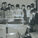 Biology Class. Notice it is all boys. For many years, Ferguson linked Biology and PE courses and taught them separately. While the girls were in the gym, the boys would be in Biology, then they would switch. This allowed all boys and all girls PE classes, then allowed boys and girls to receive separate teaching during the parts of Biology that dealt with sex and reproduction. In this picture, a forest ranger has brought in several live snakes to liven up a unit on reptiles. Until 1960, Ferguson ran very strong science programs and brought in a continual series of guest speakers to demonstrate everything from birds, insects and fish to motors, guns and electricity. During the 40s and 50s the annual stop of a Southern Railroad train behind the school so the students could peek inside the engine and see how everything worked was a big tradition. The railroad, which funded the school, needed all the engineers and scientists it could get and, indeed, many boys and a few girls from Ferguson went on to careers in science and engineering. By 1960 this had begun to fade.