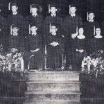 The Ferguson Class of 1956. The school held its graduation ceremonies in its beautiful auditorium, one of the nicest in the 12th Region. Several years they tried holding graduation outside but it was felt inside was classier so for the last 10 years they held them inside. The '56 class was small, with only 17. The state had a rule that for a high school to stay open it had to have 100 students in the four grades, at least 25 in each class, so years like this hurt. Shown are teacher Olen Kerns, then L to R front Wayne Sears, Bill Jones, xx, Dwight Prather (in the wheelchair), xx, Shirley Mayfield, Jerry Workman, back row l to r xx, xx, xx, Hayden Waddle, Jim Richardson, Ray Cowan, Ernold Smith, Ed Sears, xx, Wendell Wilson. Anyone who can identify the others please contact us.