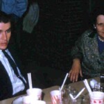 Herb Childers relaxes with Mrs. Howard Moore at the Dinner Bell Restaurant after Ferguson won the 47th district title on March 3, 1961, beating Somerset in the finals. Herb Childers relaxes with Mrs. Howard Moore at the Dinner Bell Restaurant after Ferguson won the 47th district title on March 3, 1961, beating Somerset in the finals.