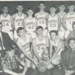 The 1966-67 Ferguson Varsity. In one year Ferguson went from having the tallest team in the state, even among colleges, to having the shortest team in the state, from averaging 6-6 across the front to averaging 5-11. That, plus inexperience and youth, were too much to overcome, and this team struggled all season. Players were transferring out in anticipation of the approaching school closure. Nevertheless, there were good players on this team, they played the toughest schedule of any Pulaski County team (including top 20 teams Louisville St. Xavier, Lexington Bryan Station, Madison Central, Scott County, Knox Central), and many of their losses were close. Across the back, from left : Jimmy Flynn (11th), Jackie Linville (11th), Darwin Minton (9th), Charlie Tucker (11th), Eddie Bill Ping (11th), David Carr (8th), Mike Richardson (11th). Kneeling in front, from left : Jerry Peters (12th), Don Minton (12th) and Larry Duncan (12th). Managers seated, Billy Bollock (left) and Doug Mitchell. Coaches are Woody Gosser (left) and Dan Omlor. Even though only 5-10, Larry Duncan finished the season as the leading rebounder in the nine team district and made the All County Team. The 1966-67 Ferguson Varsity. In one year Ferguson went from having the tallest team in the state, even among colleges, to having the shortest team in the state, from averaging 6-6 across the front to averaging 5-11. That, plus inexperience and youth, were too much to overcome, and this team struggled all season. Players were transferring out in anticipation of the approaching school closure. Nevertheless, there were good players on this team, they played the toughest schedule of any Pulaski County team (including top 20 teams Louisville St. Xavier, Lexington Bryan Station, Madison Central, Scott County, Knox Central), and many of their losses were close. Across the back, from left : Jimmy Flynn (11th), Jackie Linville (11th), Darwin Minton (9th), Charlie Tucker (11th), Eddie Bill Ping (11th), David Carr (8th), Mike Richardson (11th). Kneeling in front, from left : Jerry Peters (12th), Don Minton (12th) and Larry Duncan (12th). Managers seated, Billy Bollock (left) and Doug Mitchell. Coaches are Woody Gosser (left) and Dan Omlor. Even though only 5-10, Larry Duncan finished the season as the leading rebounder in the nine team district and made the All County Team.