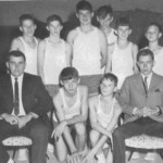 The 1966-67 Ferguson Eighth Grade Team. Kneeling are David Carr and Darwin Minton. Standing from left are Billy Denney, Haydon Goff, Jimmy (Bear) Strunk, Doug Goff, Larry Whitaker and Billy Brewster. Coaches are, left, Woody Gosser and Dan Omlor. The disintegration of the school robbed these players of what should have been glorious careers. With players already deserting the high school, they were forced to fill in as an eighth grade team, freshman team and junior varsity, pitting them at age 14 against players 16 and 17, much taller and heavier. They finished 15-0 against eighth grade teams, 10-0 against ninth grade teams, and 6-5 against JV teams. They won the eighth grade regional championship by hammering Somerset on its home floor. They scored over 80 points nine times, won by an average of 20 points, ended Mt. Victory's three year winning streak, and were ranked first in the state from January 1 until March 1. But because they had played in official JV competition they were disqualified from playing in the Eighth Grade State Tournament. David was one of the greatest players to ever come out of Ferguson, but after Ferguson closed he played his varsity ball at Pulaski County, where he made All Regional and All State and led the Maroons to the regional finals. The 1966-67 Ferguson Eighth Grade Team. Kneeling are David Carr and Darwin Minton. Standing from left are Billy Denney, Haydon Goff, Jimmy (Bear) Strunk, Doug Goff, Larry Whitaker and Billy Brewster. Coaches are, left, Woody Gosser and Dan Omlor. The disintegration of the school robbed these players of what should have been glorious careers. With players already deserting the high school, they were forced to fill in as an eighth grade team, freshman team and junior varsity, pitting them at age 14 against players 16 and 17, much taller and heavier. They finished 15-0 against eighth grade teams, 10-0 against ninth grade teams, and 6-5 against JV teams. They won the eighth grade regional championship by hammering Somerset on its home floor. They scored over 80 points nine times, won by an average of 20 points, ended Mt. Victory's three year winning streak, and were ranked first in the state from January 1 until March 1. But because they had played in official JV competition they were disqualified from playing in the Eighth Grade State Tournament. David was one of the greatest players to ever come out of Ferguson, but after Ferguson closed he played his varsity ball at Pulaski County, where he made All Regional and All State and led the Maroons to the regional finals.