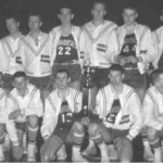 From row, l to r : Bert Minton, xxx, Bobby Cundiff, Howard Hunt, Joe Wheeler, Kerry Cowan, Melvin Cox. Back row: Asst Coach Bob Overby, Jerry Wallace, Carl Minton, Eldridge LaFavors, Mike Simpson, Gerald Nicholas, Donnie Cowan, Larry Stephens and Coach Herb Childers.
This 1961-62 team went 26-7, lost only one game in the county, never lost at home, was twice ranked first in the 12th Region, and was ranked in the state's top 25 all year. They won by scores like 79-48 over Stanford, 74-34 over Burnside, 83-42 over Shopville and 72-48 over Buckeye. Only a 51-49 loss to Danville in the regional finals kept Ferguson from a trip to Memorial Coliseum. From row, l to r : Bert Minton, xxx, Bobby Cundiff, Howard Hunt, Joe Wheeler, Kerry Cowan, Melvin Cox. Back row: Asst Coach Bob Overby, Jerry Wallace, Carl Minton, Eldridge LaFavors, Mike Simpson, Gerald Nicholas, Donnie Cowan, Larry Stephens and Coach Herb Childers. This 1961-62 team went 26-7, lost only one game in the county, never lost at home, was twice ranked first in the 12th Region, and was ranked in the state's top 25 all year. They won by scores like 79-48 over Stanford, 74-34 over Burnside, 83-42 over Shopville and 72-48 over Buckeye. Only a 51-49 loss to Danville in the regional finals kept Ferguson from a trip to Memorial Coliseum.