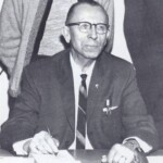 Herbert T. Higgins. He had already taught, coached and served as principal in the Pulaski County Schools for 48 years, mostly at Nancy, where he retired at age 70 after a long administrative term. However, when Howard Moore resigned as the Supervising Principal at Ferguson, and a suitable replacement could not be found, the board approached H. T. Higgins to ask if he would come out of retirement. He agreed, and thus became the last superintendant Ferguson would ever have. The Pulaski County system, like most large Kentucky systems, was very political, and Higgins had proven to be very skillful at maneuvering within the political battles over several decades. Ferguson board members hoped his connections and instinct for political survival would help them in the battle to keep the school open. He was definitely an "old school" administrator, a shrewd manager of a meager budget, a strict disciplinarian, and a no nonsense adherent to school laws. In a decade when the state had Ferguson under a microscope and was looking for any excuse to close the school, Higgins gave them no room to move. He crossed every T, dotted every i, accounted for every dollar, and made sure every teacher followed every law to the letter. Critics argued that Higgins was too traditional, that as America moved into the sixties, it was time for new programs, for innovation, to offer Ferguson kids new programs and opportunities. Their hope was that if Ferguson became a model school the state would back off and leave it alone. Higgins countered that first he had to keep the school open, and perhaps several years down the road he could worry about innovation. He had been a basketball star, and in his seventies was tall and thin, and the kids called him "Ichabod Crane" after the character in The Legend of Sleepy Hollow. His favorite method of disciplining high school kids was to make them duckwalk around the school.