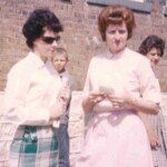Mrs. Williamson stops to talk to Mrs. Hamilton before taking their students back inside after the lunch break in September 1976. Even at this late date, eight years after the high school was closed, every year Ferguson students scored higher than any other elementary school in the county on tests of basic skills.