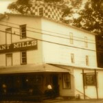 Even though Ferguson was primarily a railroad town and most of its men worked for the railroad or in timber, many people on the edges of town still farmed. They had to get their corn milled, and this was one of the mills they went to. It was along Pittman Creek. Notice the mill wheel in the lower right. A dam across the creek forced the water into a side channel where it turned the wheel, and thus the grinding wheel inside. Housewives would come here to buy their corn meal and flour. The land around Ferguson was too hilly to raise wheat, but further out in the county, around Nancy and Eubank, they did raise it. There were no streams in those areas with enough flow to turn the big wheels, so they would have to bring their wheat here or to similar mills at Burnside or Shopville. This is a 1930 photo.