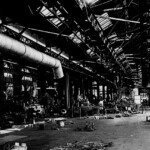 This is the interior of the smaller building in the center of the photo above. This was the machine shop, where highly specialized machinists could create any part used on any engine or car used on the Southern Railroad. They did not have to order parts from a central supplier. They made their own. And for half a century, they made them right here in Ferguson. A boy coming out of high school with mechanical dexterity might apply to the Southern for a job, score well on the test, and be sent to the railroad's own vocational school in Knoxville for training as a railroad machinist. The training course took two years and the boy would graduate with an Associate of Machining degree. In those days, this was just as impressive as a five year engineering degree is today. A certified machinist was paid very well and his package included three weeks paid vacation (one at Christmas and two in the Summer), complete health and dental care, and a comprehensive retirement package.