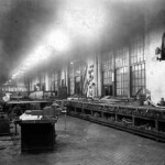 The workbench. Each man had his own area and would keep his own tools in the drawers and lower shelves. They could work here on fine detailing a part or an assembly of several parts, like a valve or housing. This would also be where they would disassemble a unit to get down to the part that needed reworked or replaced. Notice the big windows plus the intense overhead light banks. A man had to have good eyes, and needed plenty of light to see tiny details down to a sixteenth or 32nd of an inch. They talked of "variances," which meant the difference between the set measurement for a part and the measurement of the part they made. Usually a 64th of an inch variance was the maximum allowable.