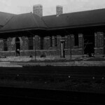 In this photo the shell of the station is complete but the interior needed a month's work. Bathrooms received special attention. Railroad officials often said passengers judged a railroad by its bathrooms as much as anything. A spacious, clean and plush bathroom made an outstanding first impression and sent the passenger out to the train already in a good mood. Officials also made sure their waiting rooms were very large, with high ceilings, comfortable benches and plenty of big windows and bright lighting. The Ferguson Depot also contained ticket windows, coffee shop (the closest thing to a snack bar they had in 1916), gift shop and luggage claim area.